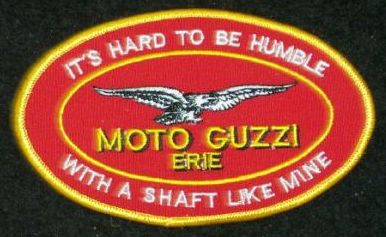 patch with moto guzzi emblem, surround text reads "it's hard to be humble with a shaft like mine"